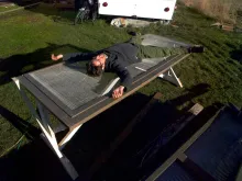 The table is easily sturdy enough to hold a human — or even 400+ kilograms of water-saturated sand, heating infrastructure, and plants!