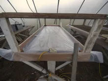 A 3" "bathtub" is constructed from 3/8" plywood and poly.